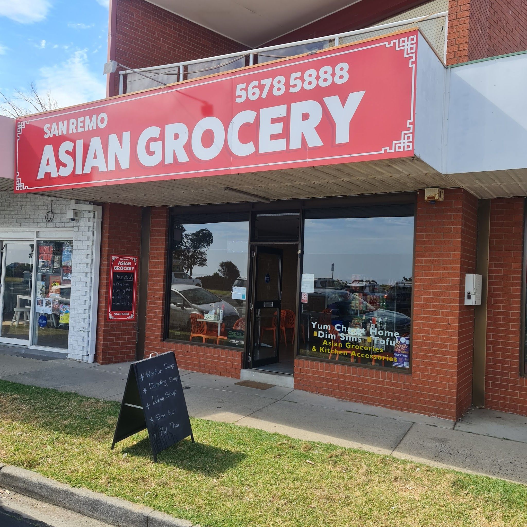 San Remo Asian Grocery storefront with red sign and A-frame chalkboard menu